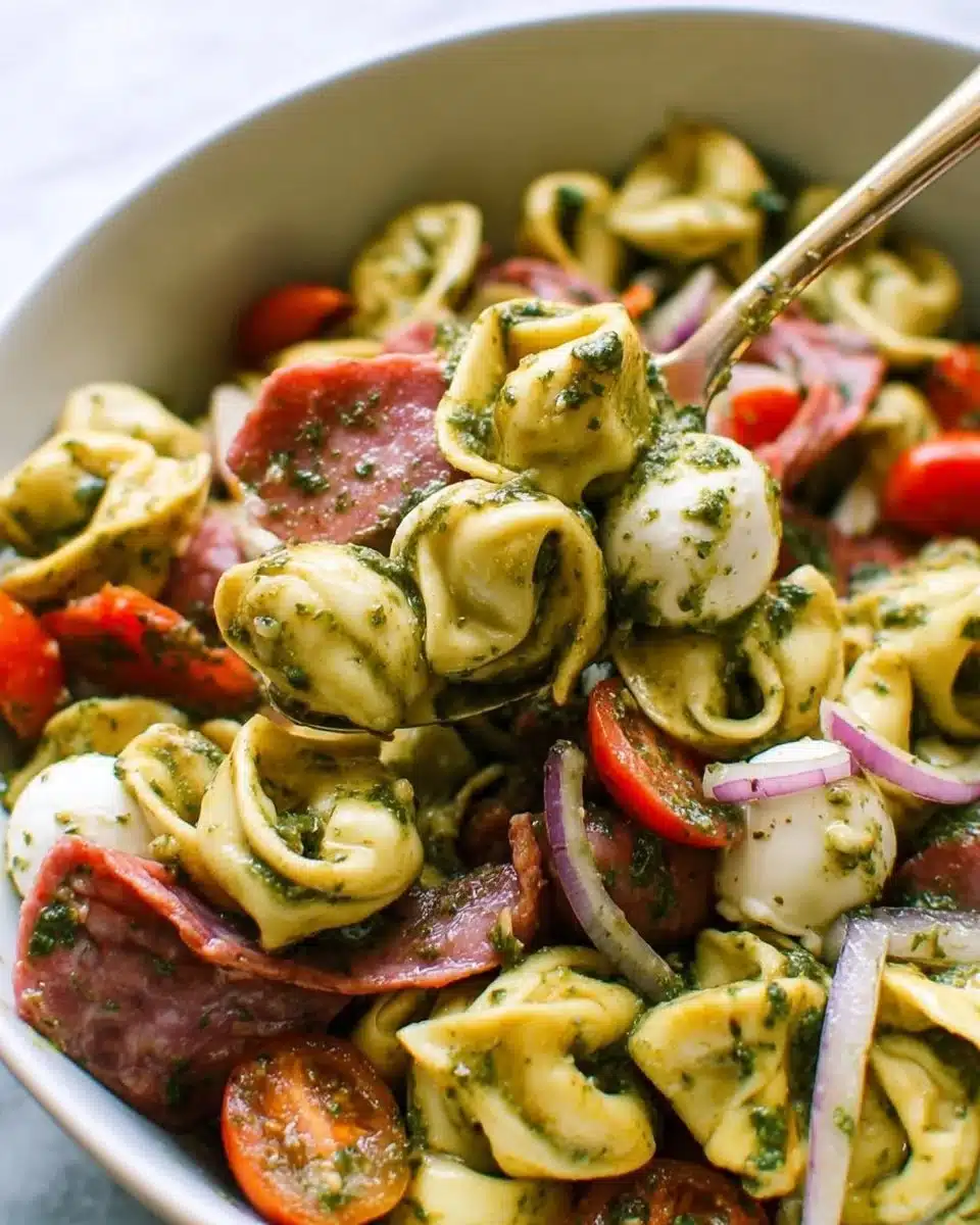 Antipasto Tortellini Pasta Salad with vibrant vegetables and dressing