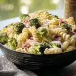 Colorful Broccoli Pasta Salad with fresh vegetables in a bowl