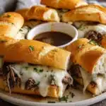 Delicious Crockpot French Dip Sandwiches served with dipping broth