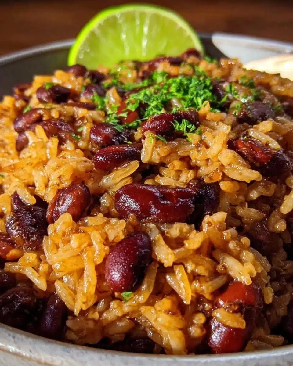 A bowl of Cuban Style Beans and Rice garnished with herbs.