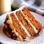 Easter Pineapple Carrot Cake topped with cream cheese frosting and fresh pineapple slices