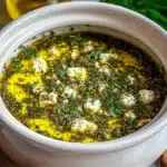 Herb and Feta Olive Oil Dip served with fresh bread and veggies