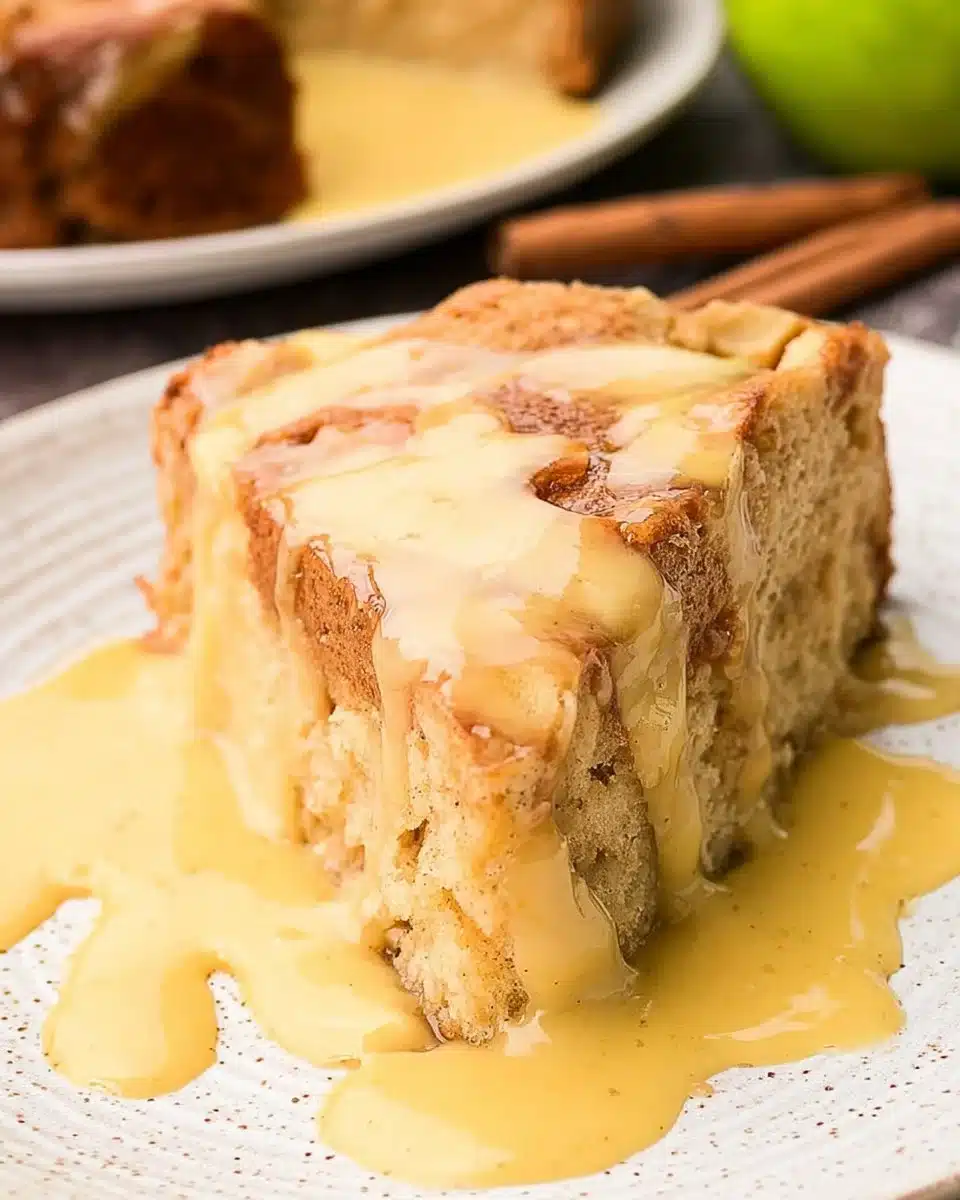 Delicious Irish Apple Cake served with rich custard sauce on a plate.