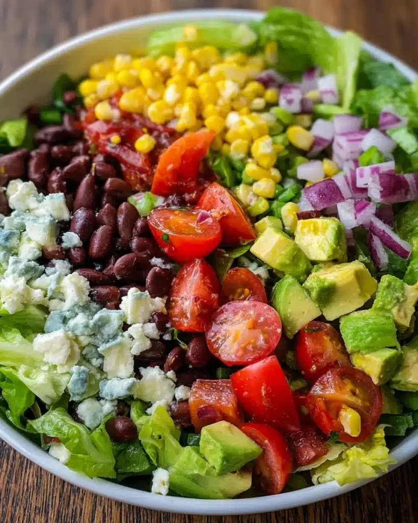 Colorful Mexican Chopped Salad with fresh vegetables and dressing