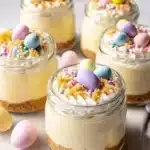 Mini Easter Cheesecake Jars topped with festive decorations