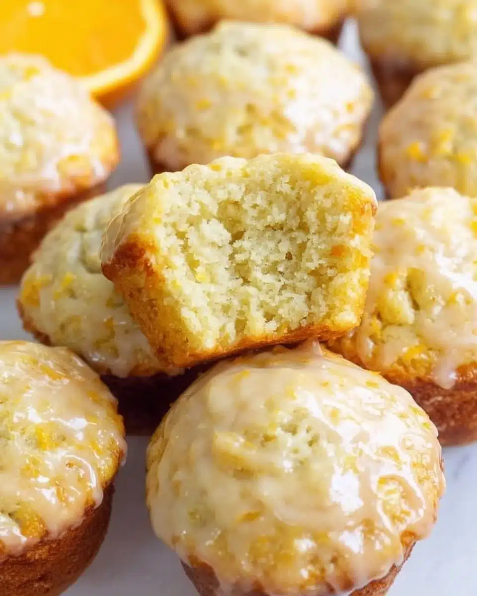 Freshly baked Orange Vanilla Buttermilk Muffins on a cooling rack