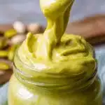 Delicious pistachio cream spread on a slice of bread