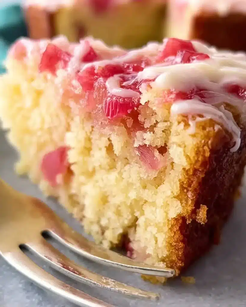 Delicious rhubarb cake made with cake mix served on a dessert plate