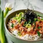 Sesame Spicy Tuna Rice Bowl with fresh ingredients and vibrant flavors.