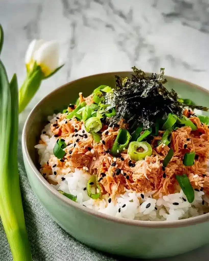 Sesame Spicy Tuna Rice Bowl with fresh ingredients and vibrant flavors.