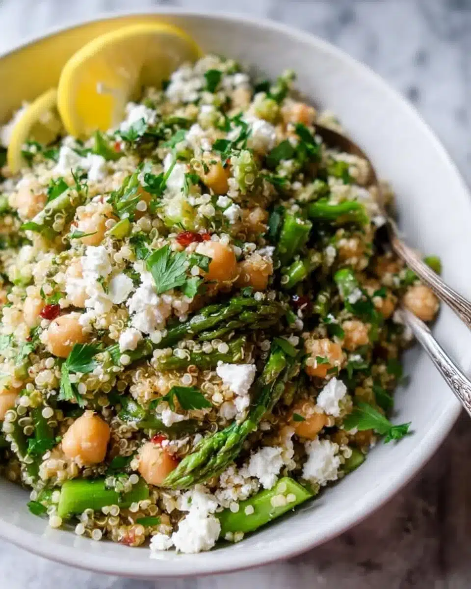 Asparagus and Chickpea Quinoa Salad with Feta served in a bowl