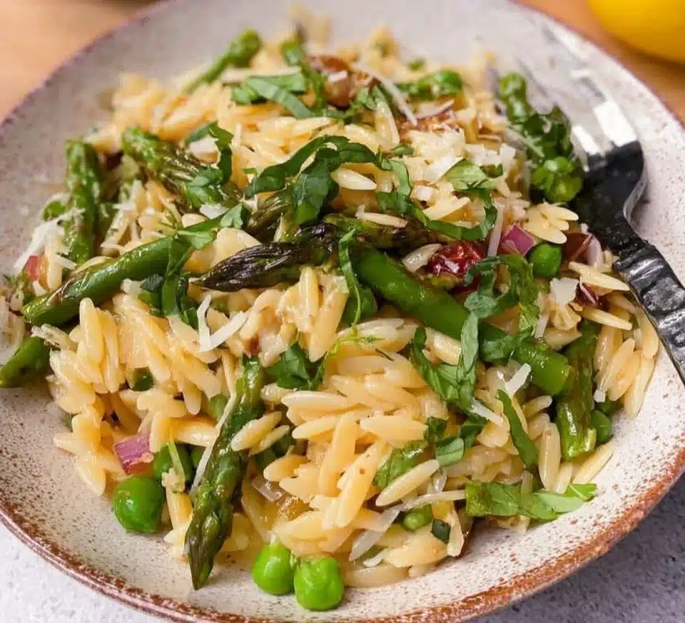 Delicious Lemon Orzo Salad with fresh herbs and vegetables