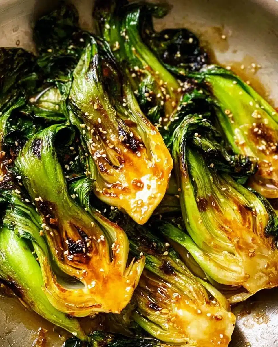 Delicious sautéed baby bok choy served on a plate.