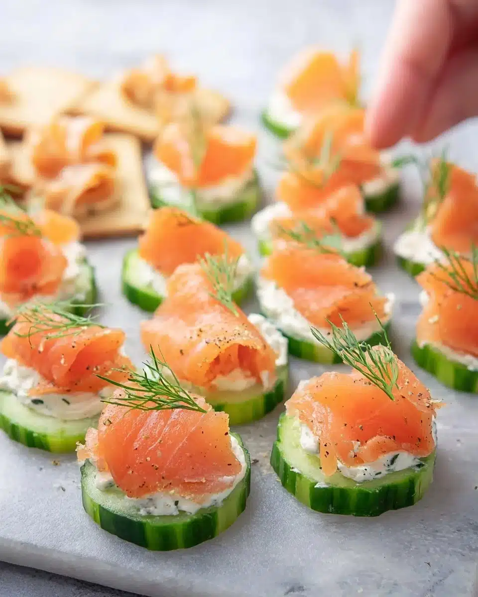 Smoked salmon cucumber bites served on a platter
