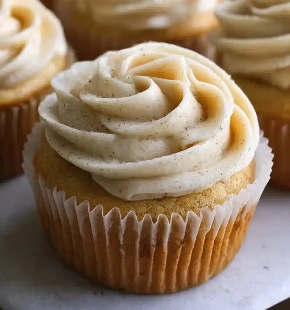 Freshly baked vanilla brown butter cupcakes topped with creamy frosting