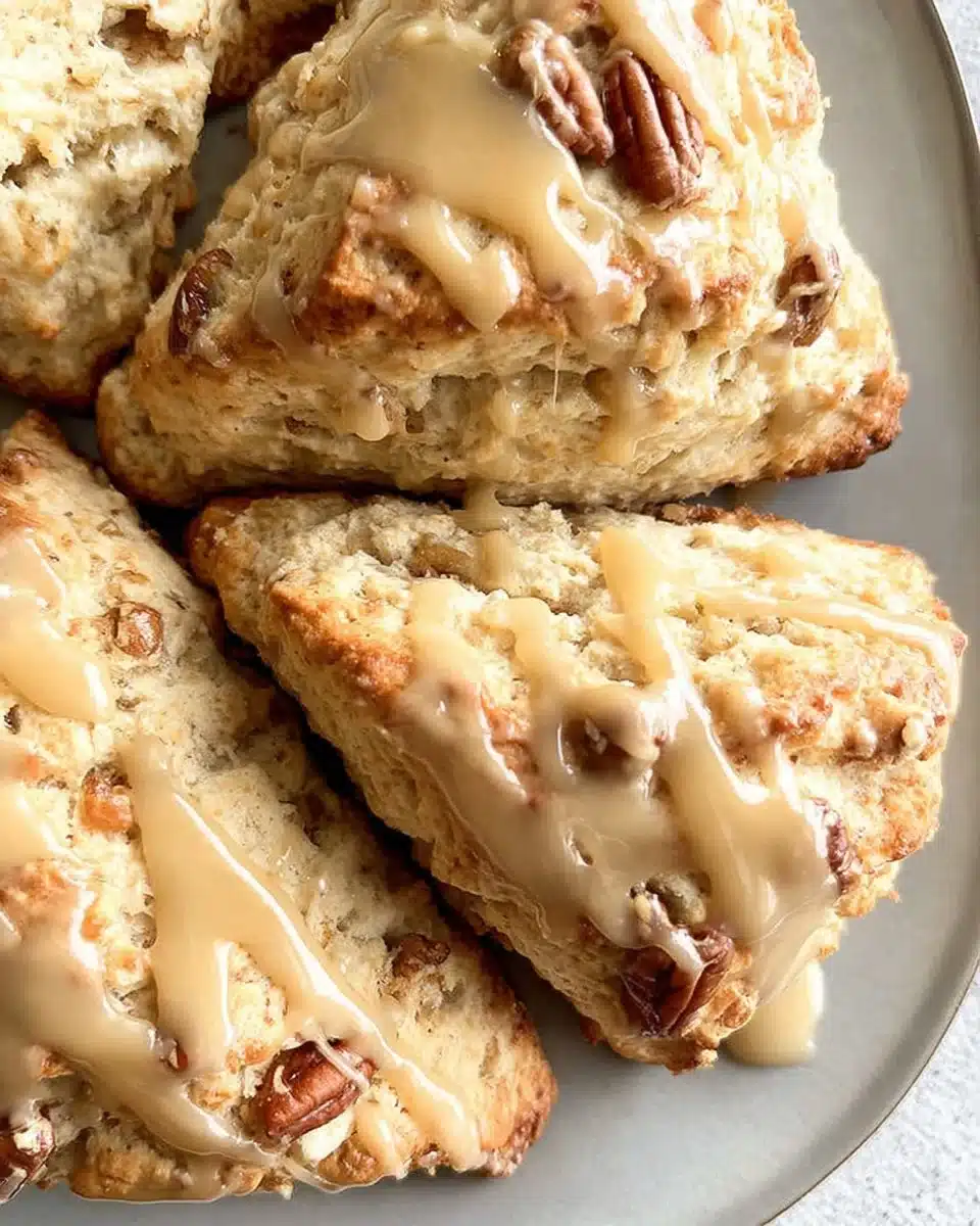 Freshly baked sourdough maple scones on a rustic wooden table