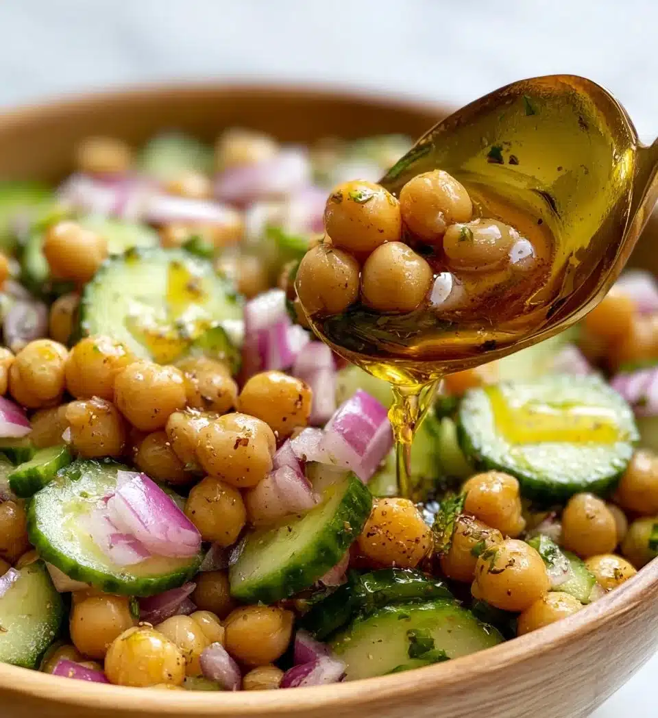 Chickpea Cucumber Salad with fresh vegetables and herbs in a bowl