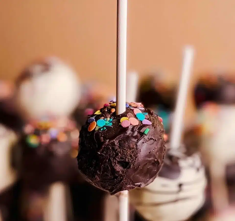 Delicious chocolate cake pops on a decorative platter