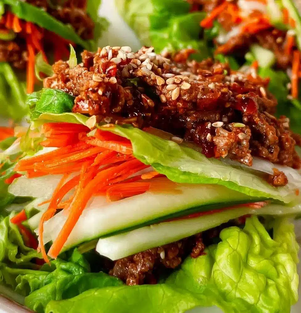 Healthy lettuce wraps filled with fresh vegetables and savory protein