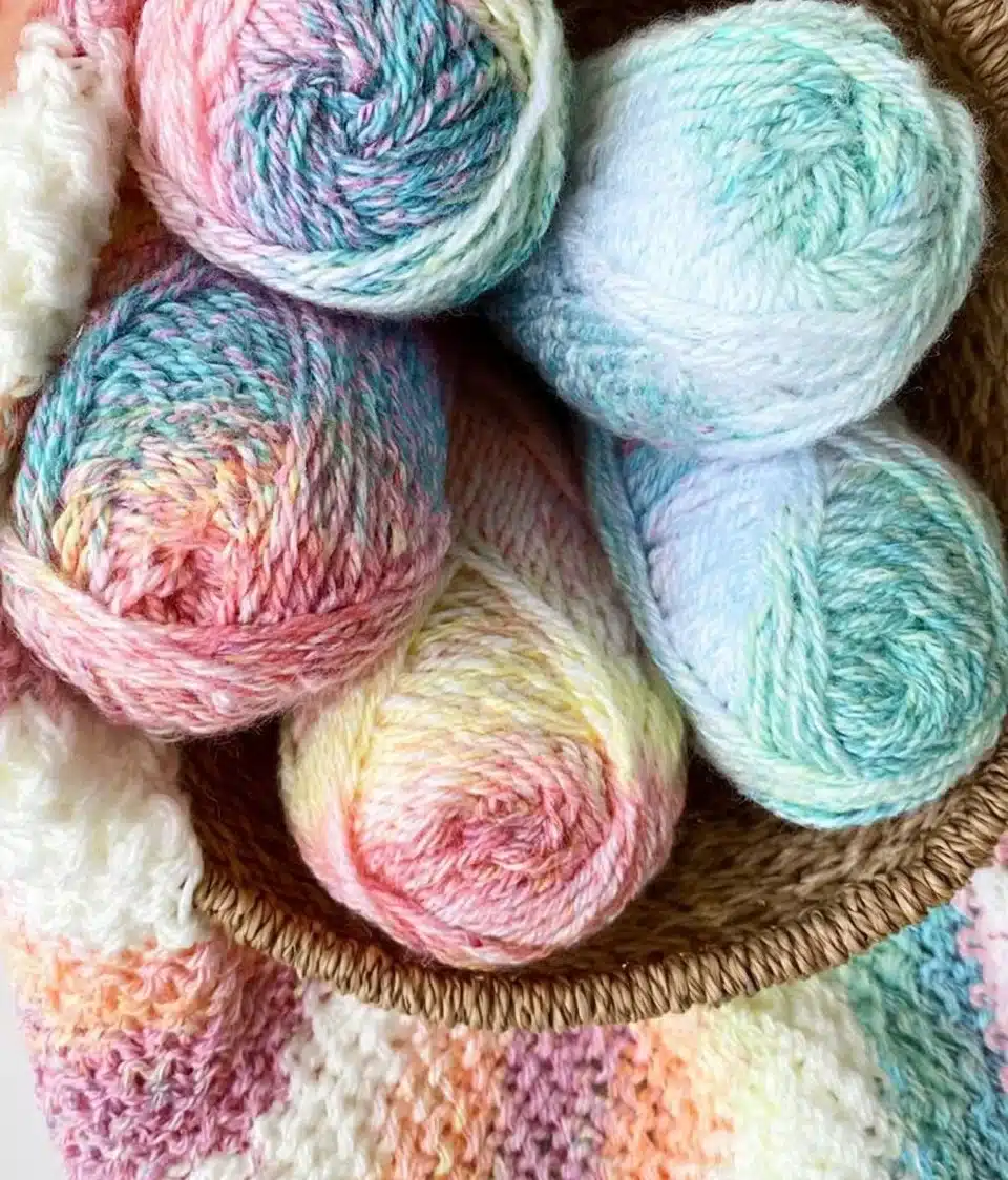 Cozy Alpine Stitch Blanket showcasing intricate patterns and rich colors.