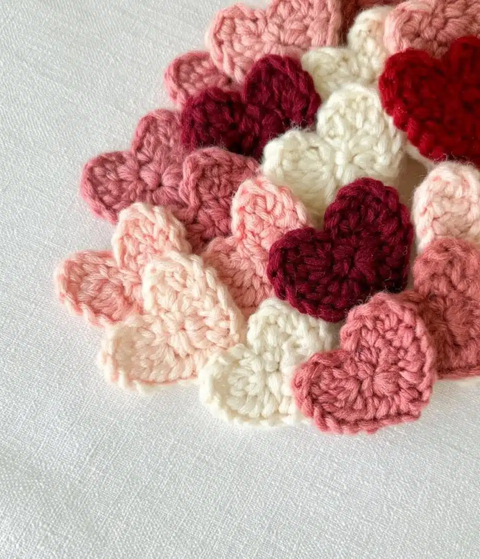 Colorful heart appliques for crafting and decorating garments.