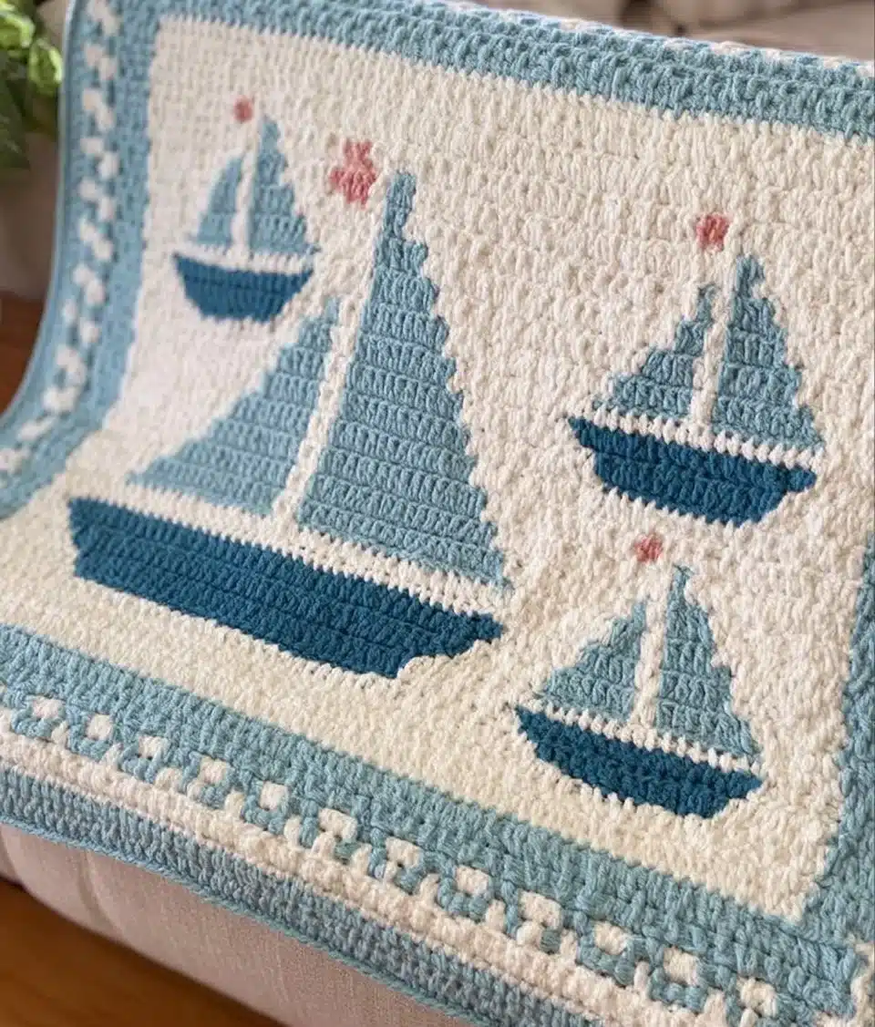Cozy sailboat blanket featuring nautical design and vibrant colors