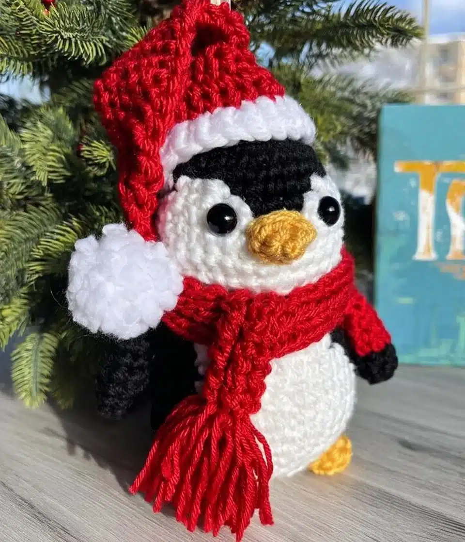 Cute Santa Penguin in festive costume ready for the holidays