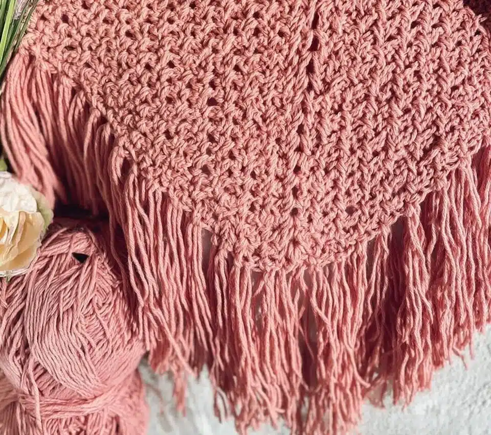 Stylish Shell Stitch Poncho crafted for comfort and warmth.